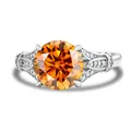 S925 silver ring featuring a large round orange moissanite and hollow filigree band - Lucky Red