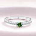 Classic S925 sterling silver ring with a round green moissanite and side stones - Dark Green