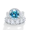 Luxurious silver ring set with 12ct blue moissanite and halo diamond pavé bands - US 5 / Aqua