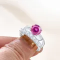 Luxe zilveren ringen set met grote rozerode ronde steen en glinsterende zijbanden - US 5 / Roze 100-facet geslepen