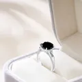 Luxury sterling silver ring set with 5-carat round black stone and baguette accents - Black