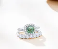 Sparkling S925 sterling silver bridal ring set with green moissanite and pave diamonds - Cyan Moissanite
