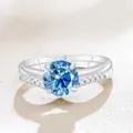 Elegant S925 sterling silver ring set with large blue moissanite and pave diamonds - Sapphire Blue