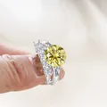 Luxury sterling silver ring set featuring a large yellow moissanite stone in silver finish - Lemon Yellow