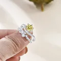 Silver ring set with a yellow round moissanite stone and S925 engraved stamp - Lemon Yellow