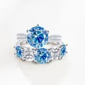 S925 sterling zilveren bruidsset met 6,6 karaat blauwe moissanite en vijf-steens ring - Saffierblauw