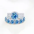 Luxury S925 silver bridal set with round blue moissanite stones and pave diamond band - Size 5 / 2-Piece Ring Set / Sapphire Blue