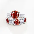 S925 zilveren trouwset met een ronde rode edelsteenring en bijpassende pavé band - Rood