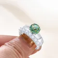 Luxe 2,7ct moissaniet ringenset met regenboogvuur op een sterling zilveren band - Blauwgroen 100-facet geslepen