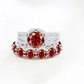 Silver S925 moissanite bridal set with orange-red halo round cut stone in golden finish - Size 5 / 2-Piece Ring Set / Red
