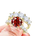 Luxe goudvergulde S925 zilveren dubbele ring set met grote ronde rode moissanite steen - Maat 5 / Granaatrood
