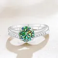 S925 silver double-band ring featuring a round green moissanite and pave white stones - Teal