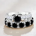 Zilveren bruidsset met ronde zwarte moissanite steen en bijpassende ringband - Maat 5 / Zwart
