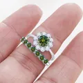 Elegant S925 silver flower moissanite ring set with green gemstone on woman finger - US 5 / Dark Green