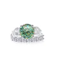 Luxurious 925 silver 12 carat moissanite bridal ring set with round and pear cut stones - Multi-faceted Blue-Green
