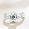 Elegant S925 sterling silver moissanite ring set with a round cut main stone - White with White Facet