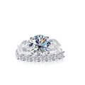 Luxurious silver moissanite ring set featuring a three-stone design and shimmering band - White