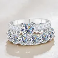 Elegante 8 karaat moissaniet zilveren ringenset met grote ronde steen en pavé - Maat 5 / Wit