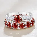 Schitterende zilveren ringenset met grote rode moissanite en pavéstenen - Maat 5 / Rood