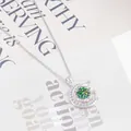 Eleganter Anhänger aus S925 Silber in Halbmondform mit rundem grünem Moissanit-Stein - Blaugrün