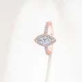 Detailed macro view of S925 sterling silver marquise cut halo moissanite ring - Ring / Rose Gold