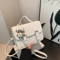 Vintage cream small square handbag with parallel metal buckles and cute cartoon pendant - With Pendant / White