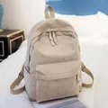 Minimalist beige corduroy backpack with large front pocket and adjustable straps - No Pendant / Tan
