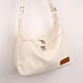 Minimalist cream white oxford shoulder bag with double zipper pockets and strap - White