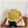 Elegant gold pleated shell bag with large pearl handle and metal chain strap - Gold
