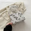 White butterfly printed square tote bag with star patterns and golden strap hardware - Gray
