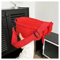 Minimalist red nylon crossbody waist bag with woven zipper pull for casual sports wear - Red