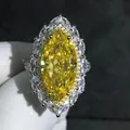 Luxurious 10ct marquise yellow diamond ring with double halo setting on silver band - Size 5 / Yellow