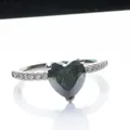 Teal heart-shaped moissanite ring with a silver band and small diamonds on white background - Size 5 / Blue-Green (1 Carat)