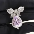 Elegant bowknot silver pendant with 10ct pear-cut pink carbon diamond in micro-pave setting - Pendant Only (No Chain) / Pink