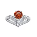 Detail eines V-förmigen Kronenrings mit orangefarbenem Stein und Silberakzenten - US 5 / Glücksrot