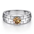 Detail of 5mm moissanite ring with watch band texture and polished sterling silver band - Champagne