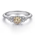 Macro view of 0.5ct champagne moissanite ring in S925 silver with halo side stones - Size 5 / Original Yellow