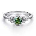 Bovenaanzicht van S925 zilveren ring met 0,5 ct groene moissaniet en halo-zetting - Maat 5 / Donkergroen