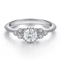 Elegante s925 zilveren ring met 0,5ct moissaniet middensteen en halo zij-diamanten - Maat 5 / Wit