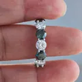 Detail of silver S925 ring with alternating green and white moissanite stones - Size 5 / Dark Green and White