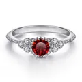 Zilveren S925 ring met een 0,5 karaat ronde rode moissaniet en zijdelingse diamanten - Maat 5 / Granaatrood
