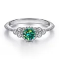 S925 sterling silver ring featuring a 0.5ct round green moissanite in a floral setting - Size 5 / Verdant