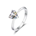 Close-up of heart-cut moissanite silver ring showcasing exquisite fire and 3-prong setting - Size 5 / White