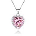 Close-up of heart-shaped pink moissanite pendant with halo diamonds in silver chain - 2 Carat 8mm / Light Pink