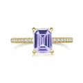 Close-up of emerald cut pink moissanite ring in gold plated S925 silver setting - Light Purple