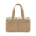 Close-up of corduroy diaper bag organizer showing beige ribbed texture and inner compartments - Camel