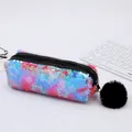 Gradient sequin pencil case with star pattern and black pom-pom charm on light desk - Rose Red with Star