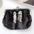 5-inch black sequin coin purse with silver stripes and classic metal kiss-lock closure - Black + Silver