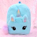 Detail of plush blue unicorn backpack with rainbow sequin horn and pink pompom - Blue