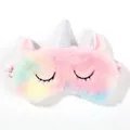 Detailed macro view of colorful unicorn plush sleep mask with soft texture and silver horn - Colorful